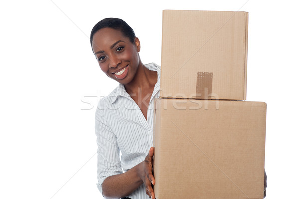 Young girl with cardboard boxes in hand Stock photo © stockyimages