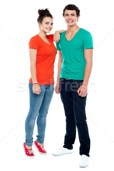 Full length portrait of fashionable young couple Stock photo © stockyimages