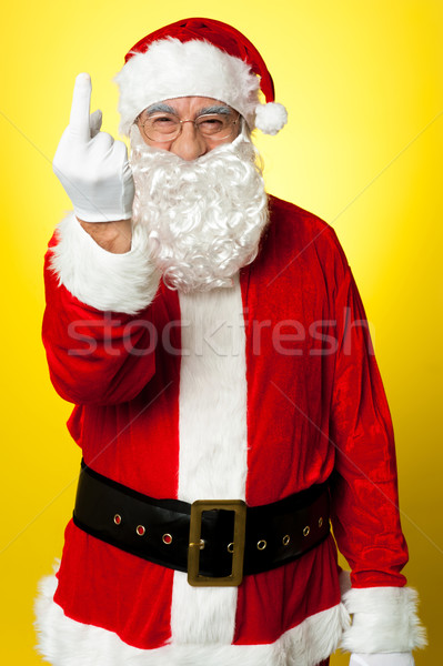 憤怒 聖誕老人 顯示 中間 手指 孤立 商業照片 © stockyimages