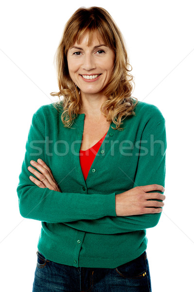 Smiling fashion lady posing casually Stock photo © stockyimages