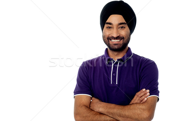 Young man posing casually over white Stock photo © stockyimages