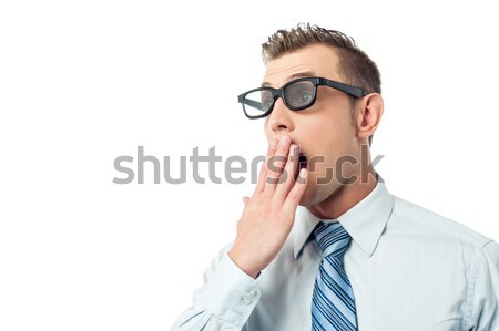 Young businessman, hand on mouth Stock photo © stockyimages