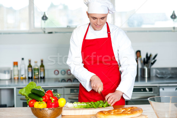 Chef preparing the dish Stock photo © stockyimages