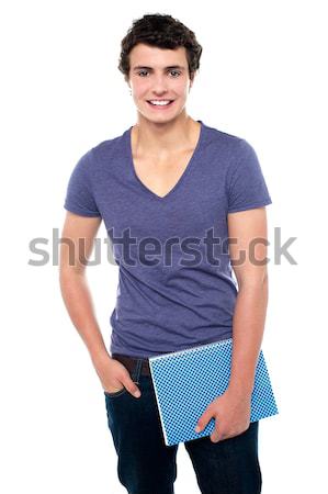 Stylish teenager posing casually in denims Stock photo © stockyimages