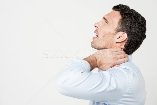 Mijn nek pijnlijk mannelijke nekpijn geïsoleerd Stockfoto © stockyimages