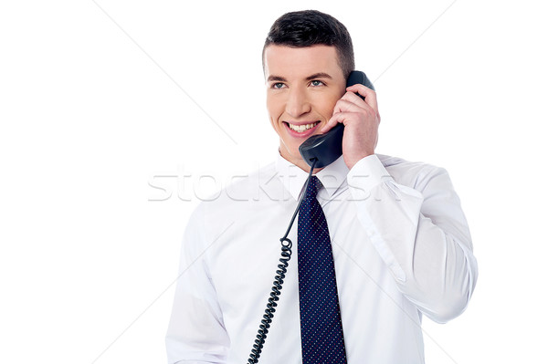 Jonge professionele telefoongesprek knap mannelijke uitvoerende Stockfoto © stockyimages