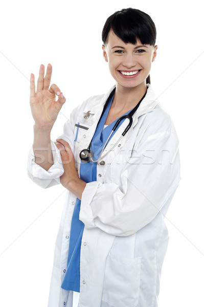 Sonriendo médicos practicante perfecto signo Foto stock © stockyimages