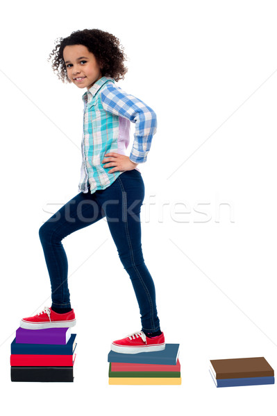 Successful child moving up in school grades Stock photo © stockyimages