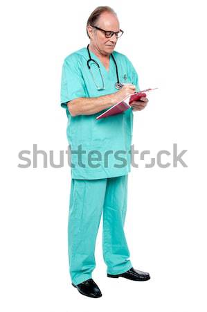 Teljes alakos kilátás mosolyog tapasztalt orvosi profi Stock fotó © stockyimages