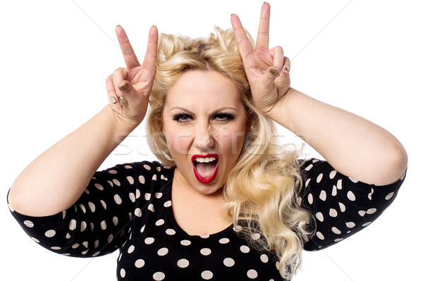 Méchant posent jolie femme colère femme Photo stock © stockyimages