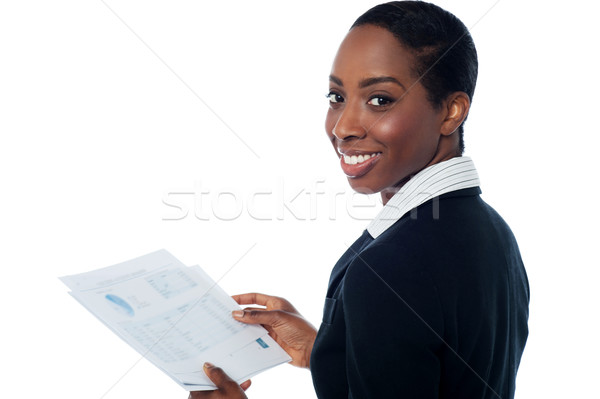 Employer reviewing project reports Stock photo © stockyimages