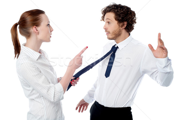 Businesswoman scolding her colleague Stock photo © stockyimages