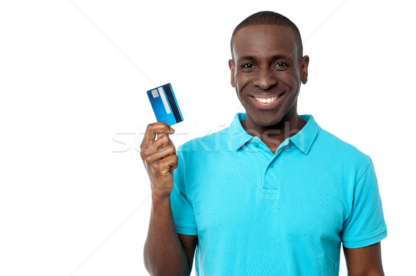 Souriant Guy carte de crédit élégant jeune homme [[stock_photo]] © stockyimages