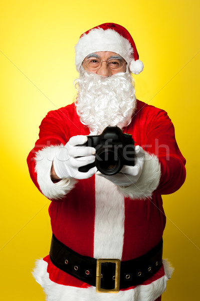 Kerstman merk nieuwe dslr glimlach Stockfoto © stockyimages
