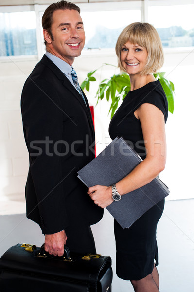 Businessman leaving office to attend meeting Stock photo © stockyimages