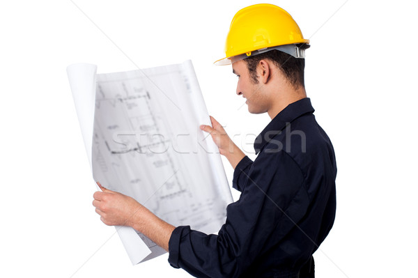 Construction worker reviewing plan Stock photo © stockyimages
