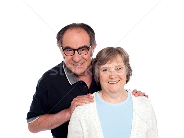 Lovable husband posing along with wife Stock photo © stockyimages