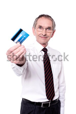 Cropped image of a man showing credit card Stock photo © stockyimages
