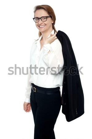 Sorridente patrão caminhada sala de reuniões bem sucedido feminino Foto stock © stockyimages