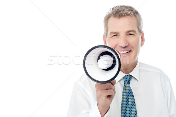 Senior man posing with megaphone Stock photo © stockyimages