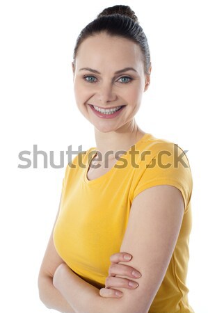 Uśmiechnięty portret chudy nastolatek stwarzające fałdowy Zdjęcia stock © stockyimages
