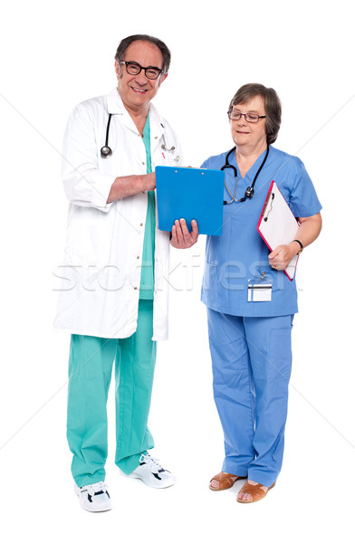 Doktor hemşire rapor birlikte beyaz çalışmak Stok fotoğraf © stockyimages