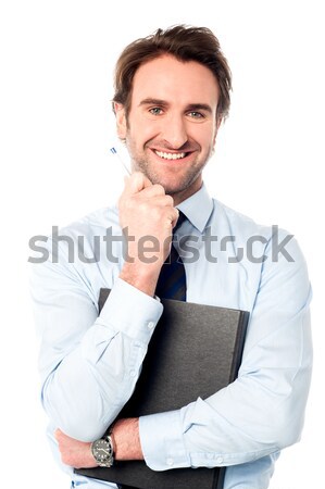 Corporate man holding important file Stock photo © stockyimages