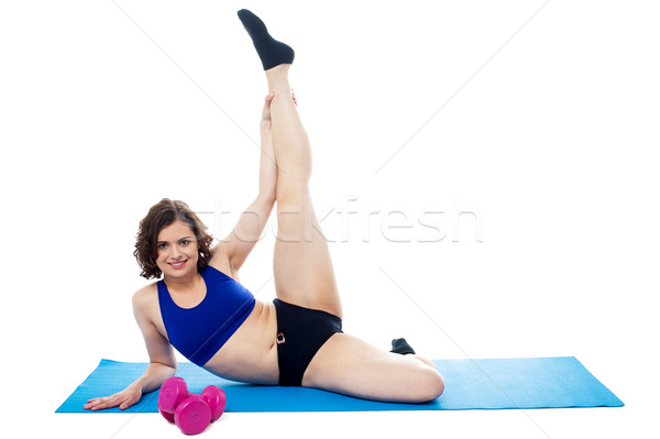 Female instructor doing her aerobic routine Stock photo © stockyimages