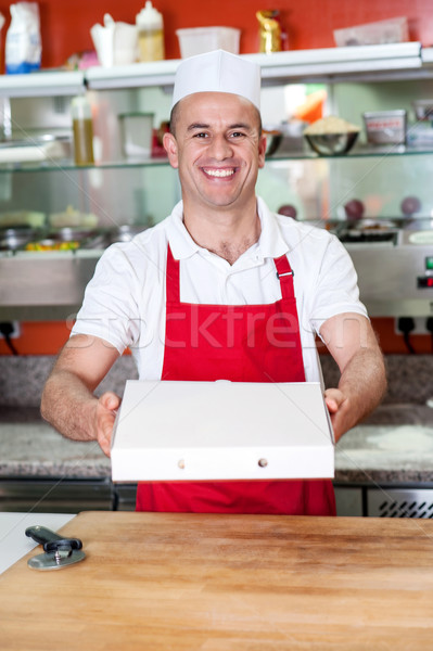 Here is the pizza you ordered! Stock photo © stockyimages