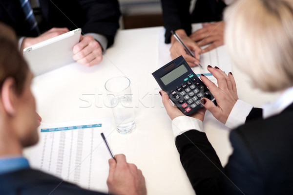 üzletemberek megbeszélés együtt csoport üzleti csapat éves Stock fotó © stockyimages