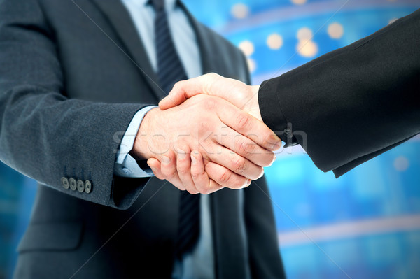 Business deal finalized, congratulations! Stock photo © stockyimages