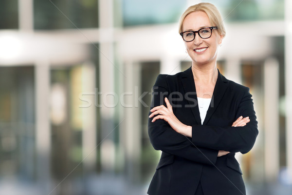 女性 執行 笑みを浮かべて 女性実業家 ポーズ ストックフォト © stockyimages