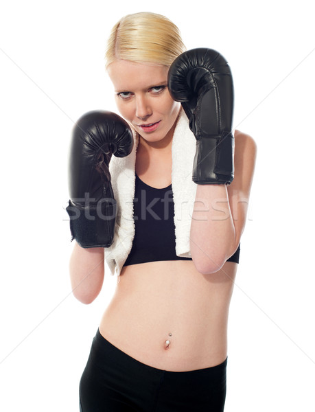 Caucasian girl in a defence pose Stock photo © stockyimages