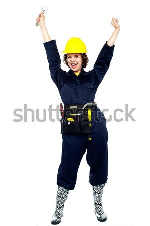 Craftswoman celebrating her success Stock photo © stockyimages