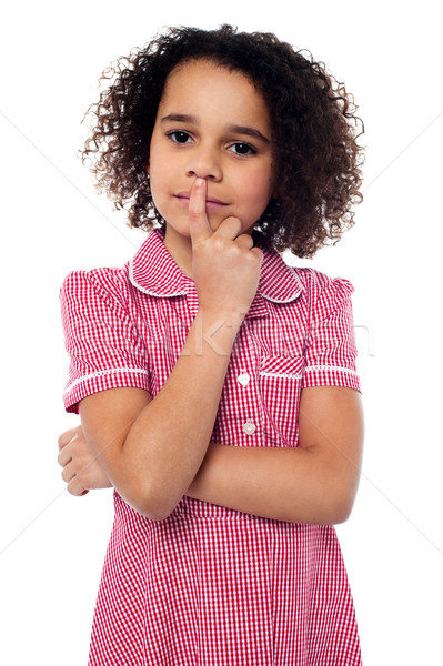 Pretty african american gesturing silence Stock photo © stockyimages