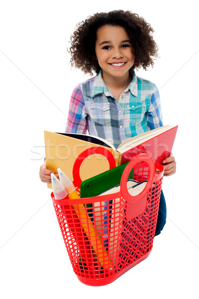 Elementary age school girl reading a book Stock photo © stockyimages