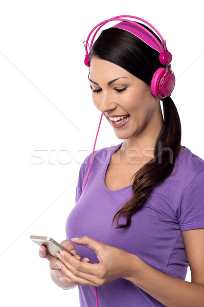Wow mijn favoriet lied jonge vrouw luisteren Stockfoto © stockyimages