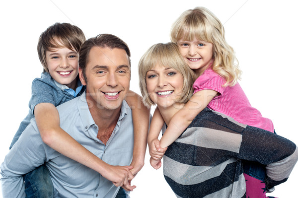 Kaukasisch familie vier studio portret vriendelijk Stockfoto © stockyimages