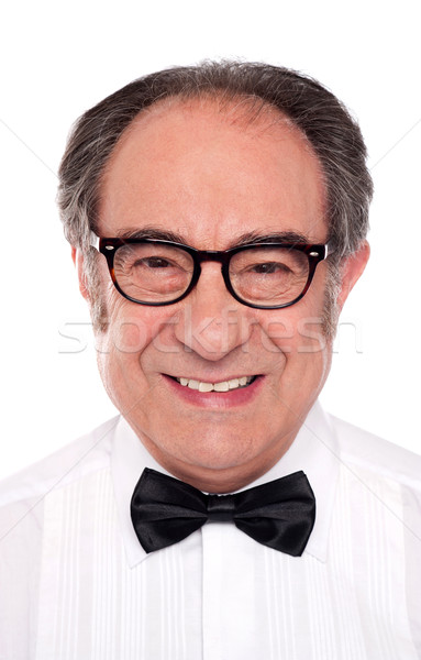Stock photo: Closeup portrait of smiling senior man