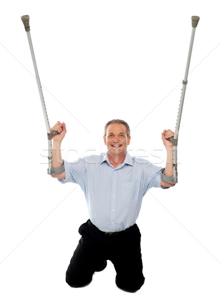 Aged man thanking God while recovering from injury Stock photo © stockyimages