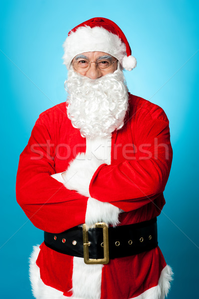 Confident aged male in Santa costume Stock photo © stockyimages