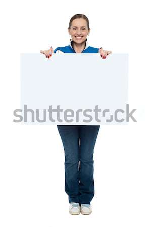 Helyes hely termék portré nő tábla Stock fotó © stockyimages