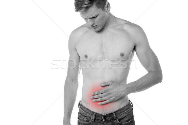 Chorych żołądka bolesny młody człowiek ręce Zdjęcia stock © stockyimages