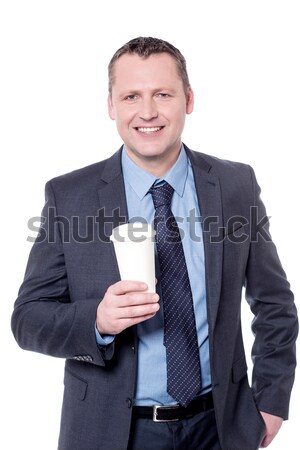 Businessman operating tablet device Stock photo © stockyimages