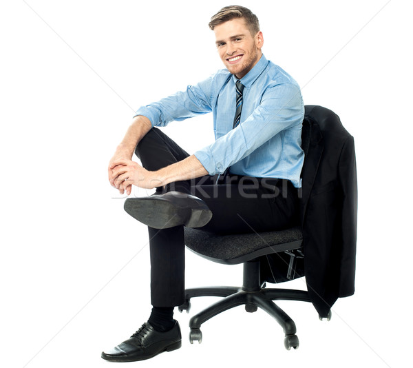 Relaxed businessman posing casually Stock photo © stockyimages
