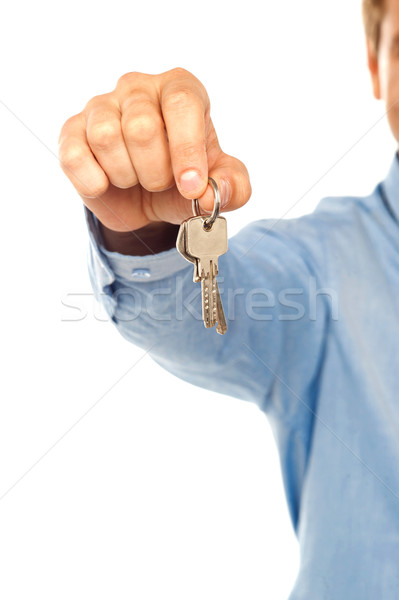 Man holding keys. Shallow DOF Stock photo © stockyimages