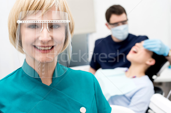 Stockfoto: Mannelijke · tandarts · patiënt · kliniek · vrouw · assistent