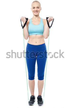 Woman working out with bands Stock photo © stockyimages