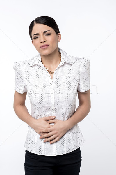 Omg mulher estômago mãos jovem Foto stock © stockyimages