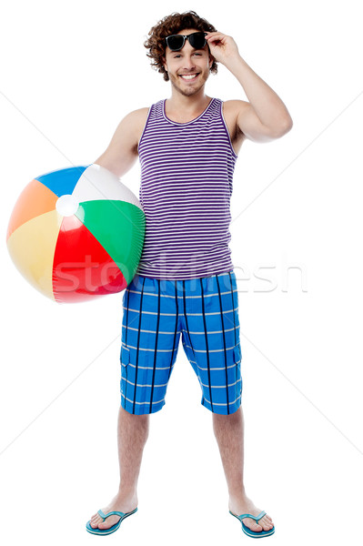 Mosolyog férfi élvezi nyaralások jóképű fiatal Stock fotó © stockyimages
